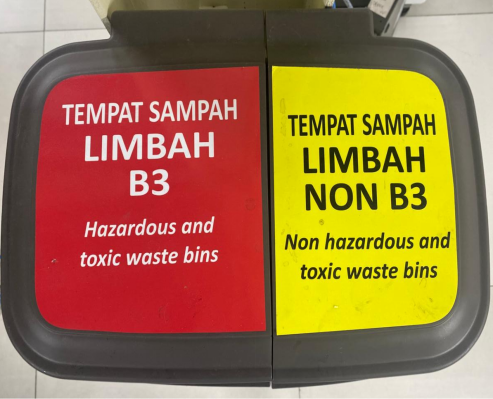 Lid labels for hazardous and non-hazardous waste bins